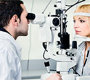 Woman having an eye check up