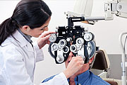 Doctor checking a patients eyes